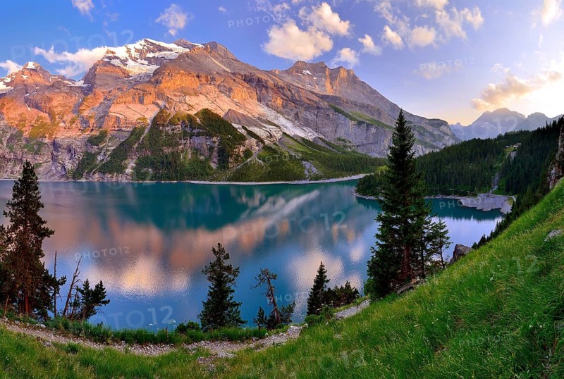 Mountains in evening light on Oeschinen Lake