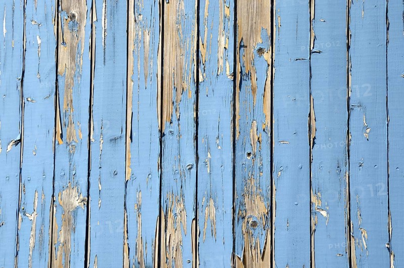Wall made of light blue wooden slats