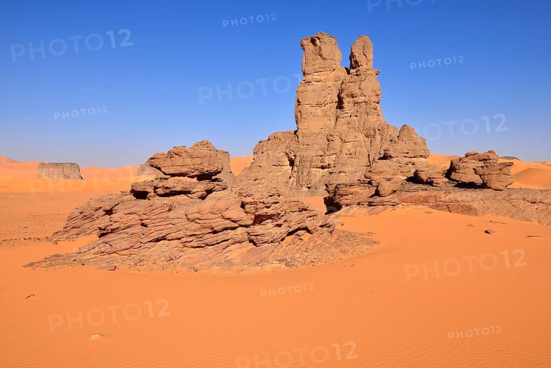 Sanddunes and rock towers at Moul Naga