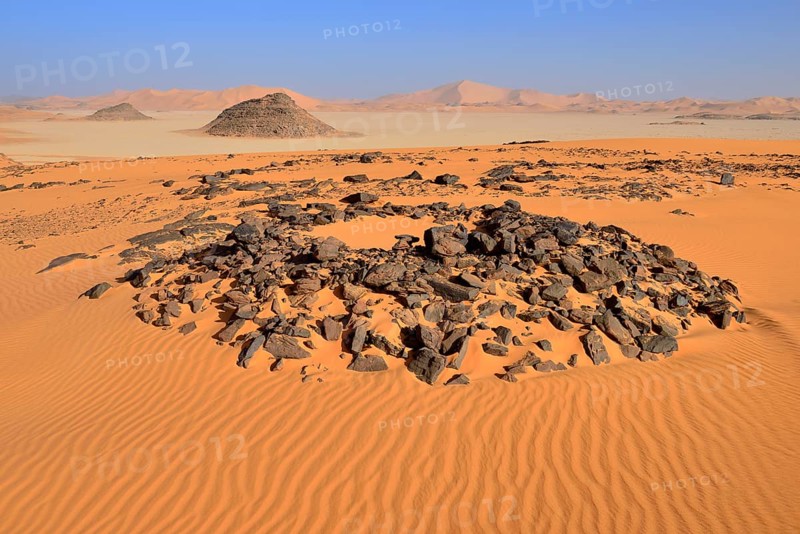 Tumulus burial mound in the sanddunes of Oued In Djerane