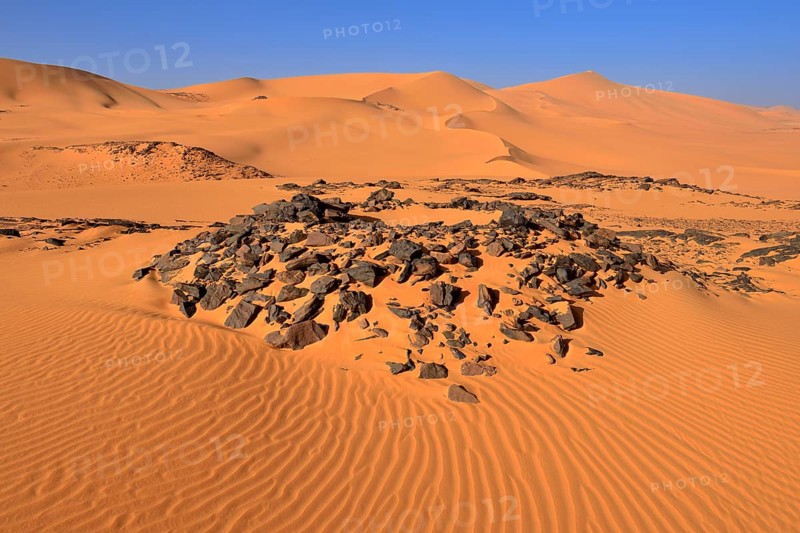 Tumulus burial mound in the sanddunes of Oued In Djerane