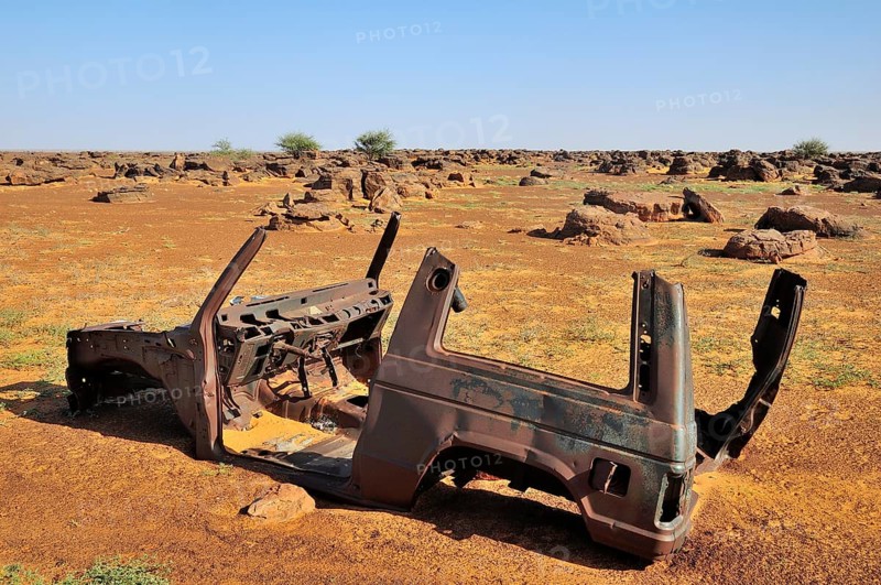 Wreck of an SUV in the desert