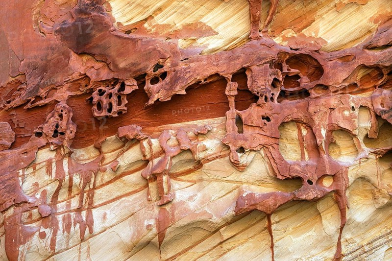 Coloured rock erosion