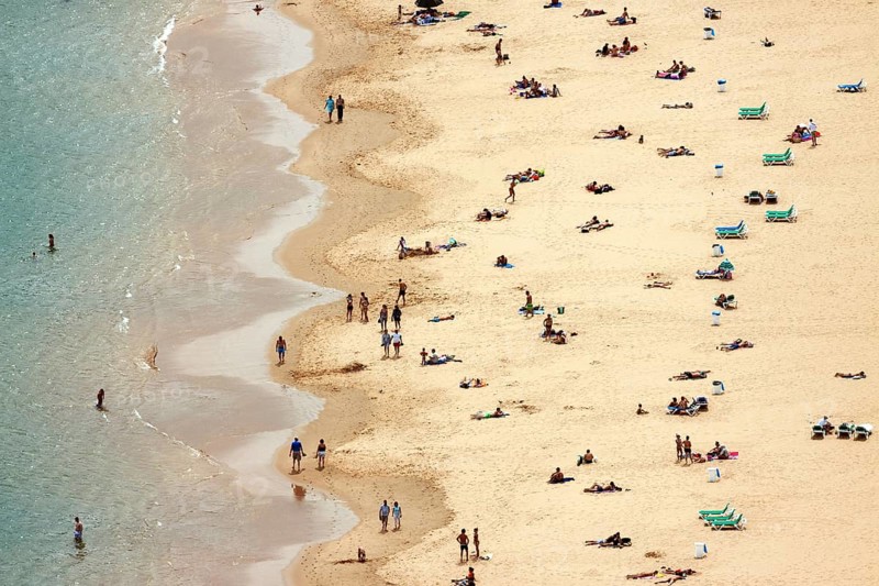 People lying on the beach