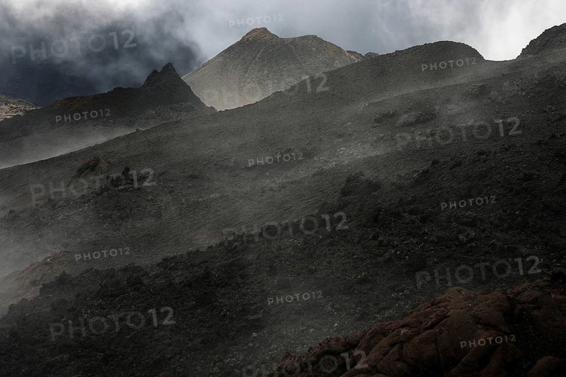 Volcanic landscape with clouds