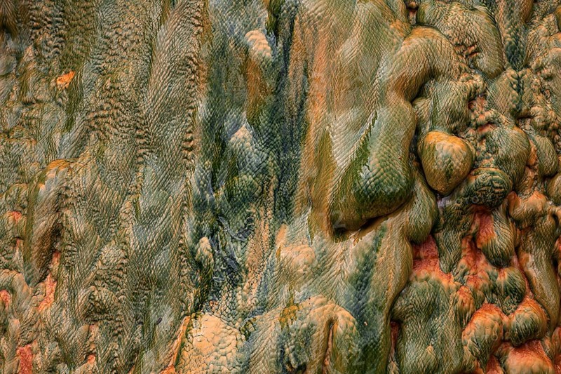 Colored mineral deposits in a thermal spring in Cilaos Cirque de Cilaos