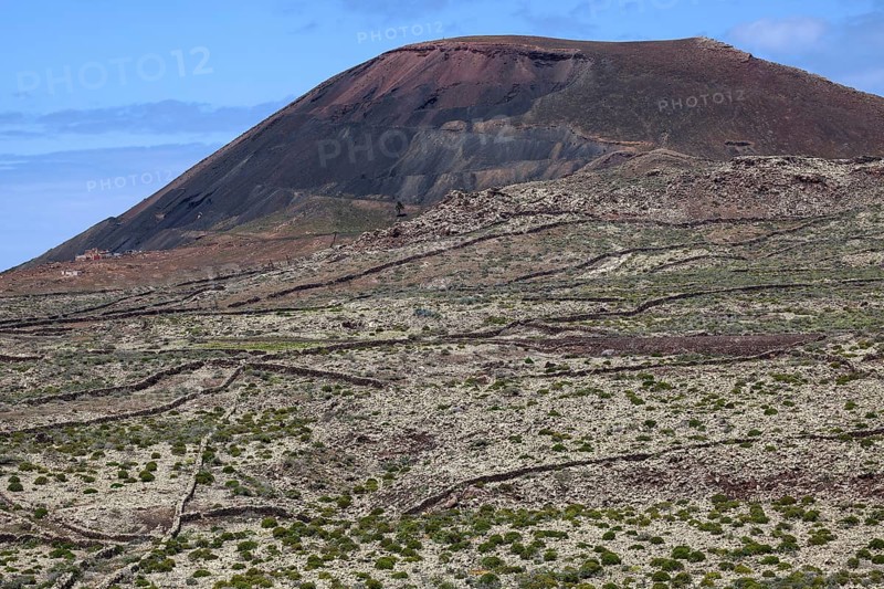 Barren landscape and volcanic mountain Arena in Villaverde