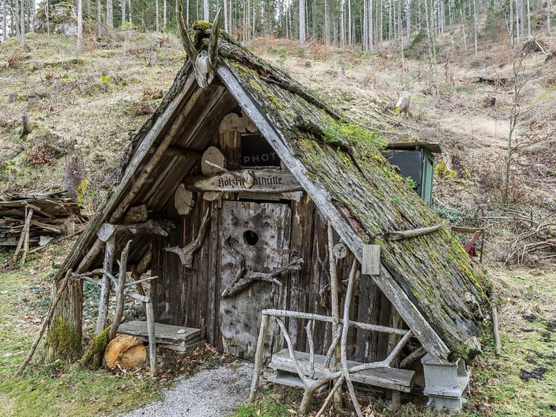 Quaint woodcutter's hut in the forest