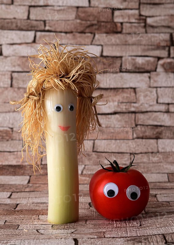 Leek and tomato with faces