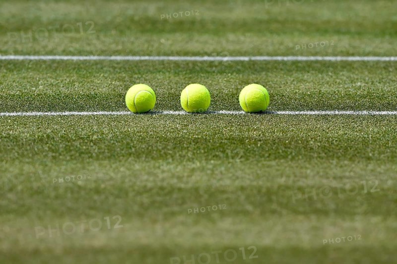 Tennis balls on lawn