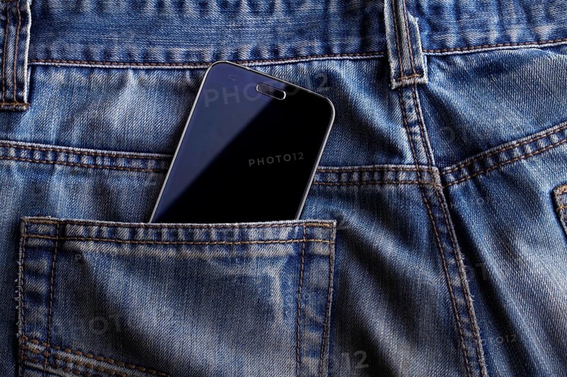 Smartphone in the pocket of jeans