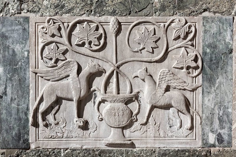 Two winged griffins