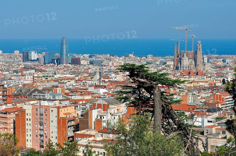 View from the Parc Guell towards the city with Sagrada Familia and Torre Agbar