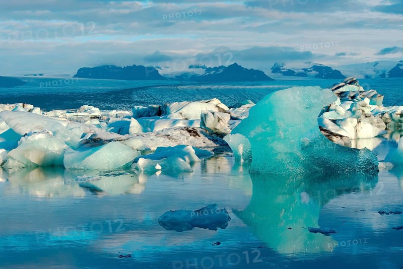 Blue iceberg floating in the lake