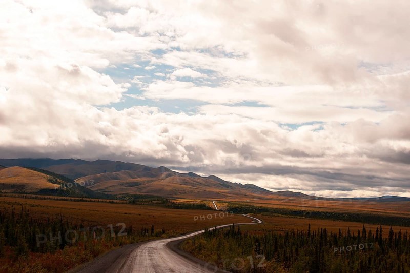 Dempster Highway under clouded sky