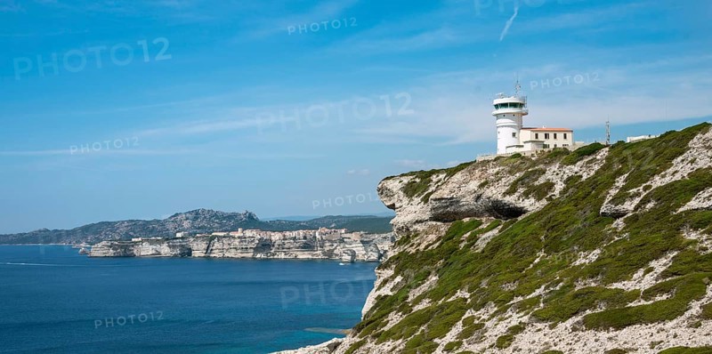 Lighthouse by the steep coast