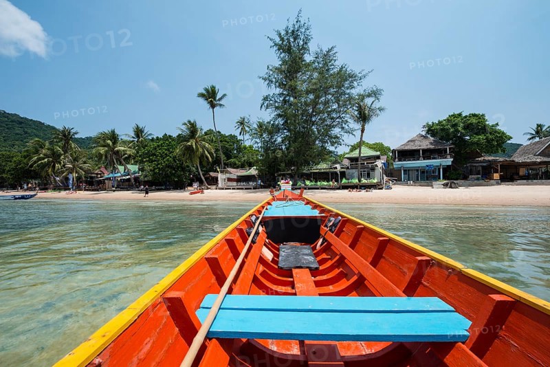 Bow of longtail boat in sea