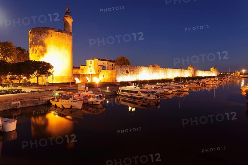 Defence tower Tour de Constance with city walls at night