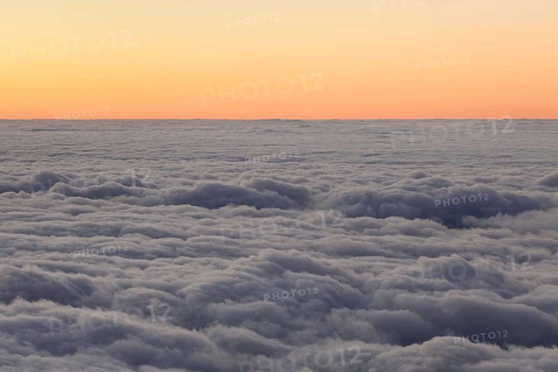 Sunset above the clouds