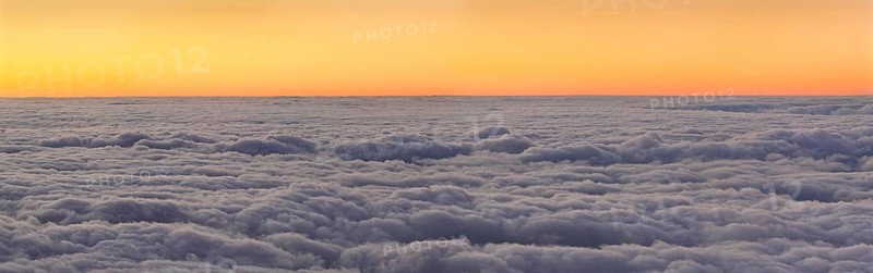 Sunset above the clouds