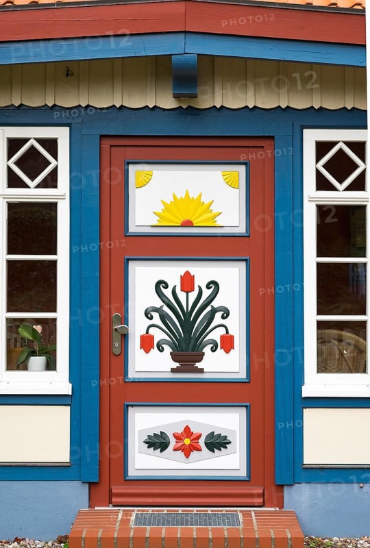 Traditionally painted door of a captain's house