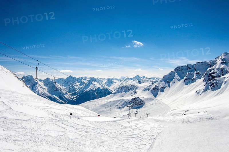 Panoramic view into the Swiss Alps ski resort Motta Naluns