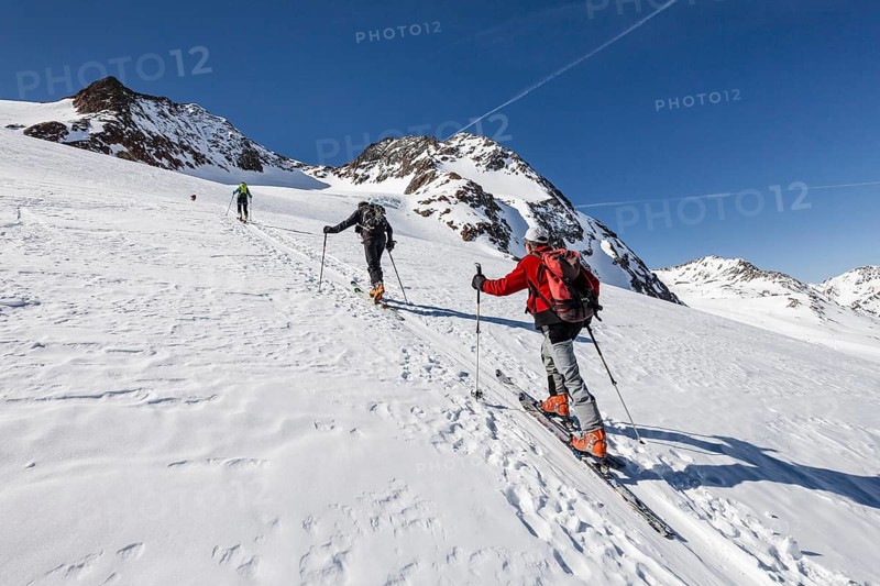 Ski tourers ascending Fineilspitze peak