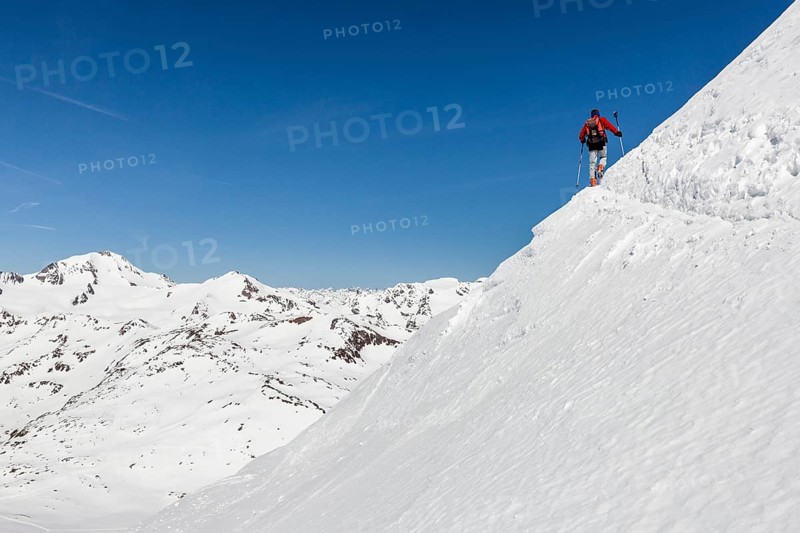 Ski tourers ascending Fineilspitze peak