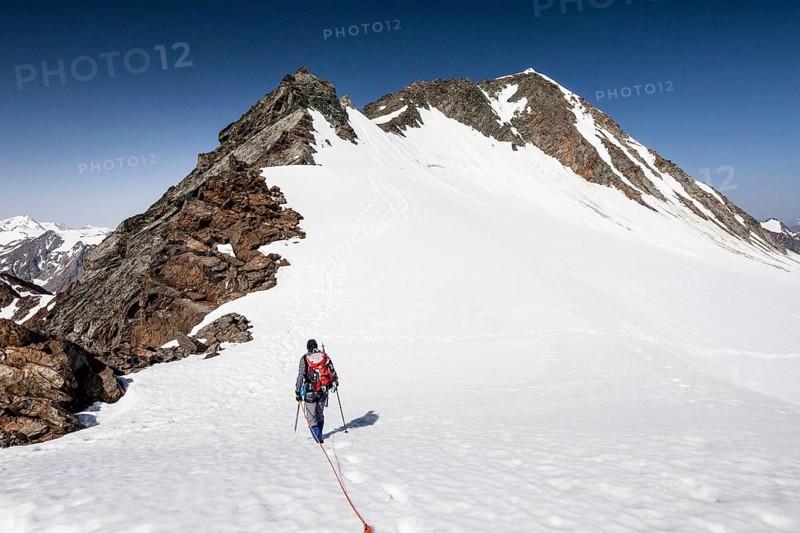 Climber on the descent from the Wildspitze at Mitterkarjoch