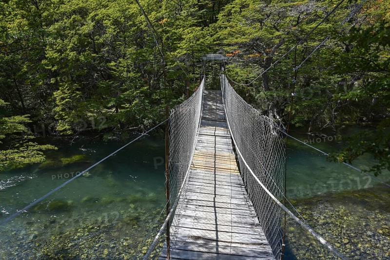 Suspension bridge at the footpath to Glaciar Huemul at Lago del Desierto