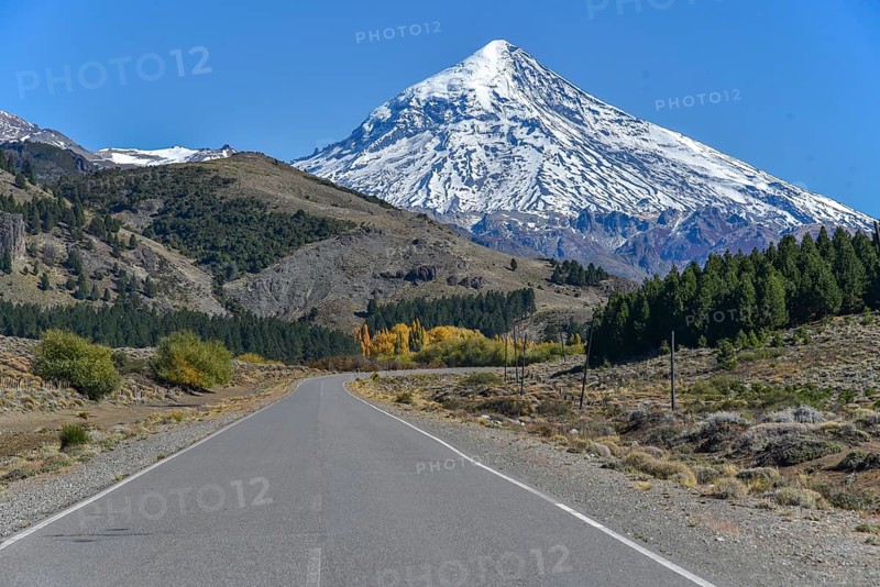 Road with snow covered volcano Lanin