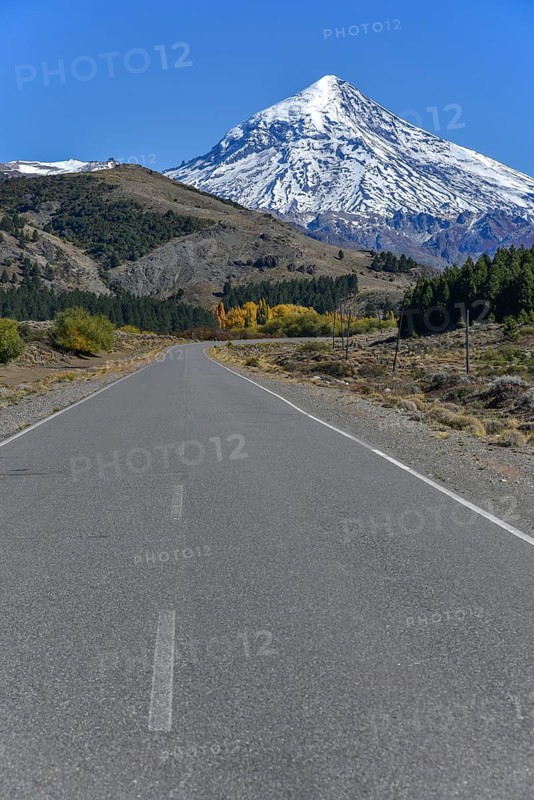 Road with snow covered volcano Lanin