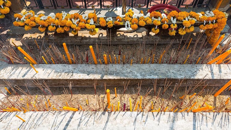 Incense and candles in a temple