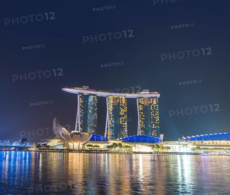 Marina Bay Sands Hotel by the Singapore River at night