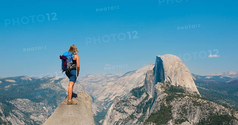 Hiker standing on a cliff