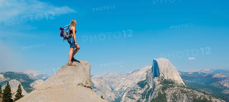 Hiker standing on a cliff