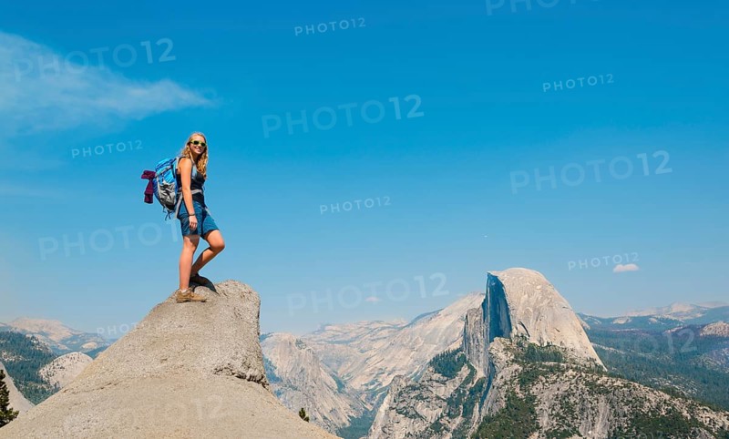 Hiker standing on a cliff