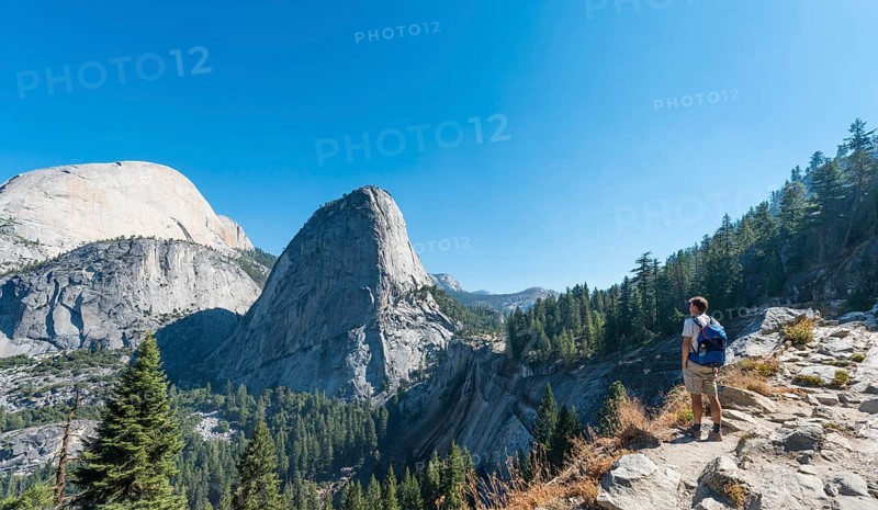 Walker looking on Liberty Cap
