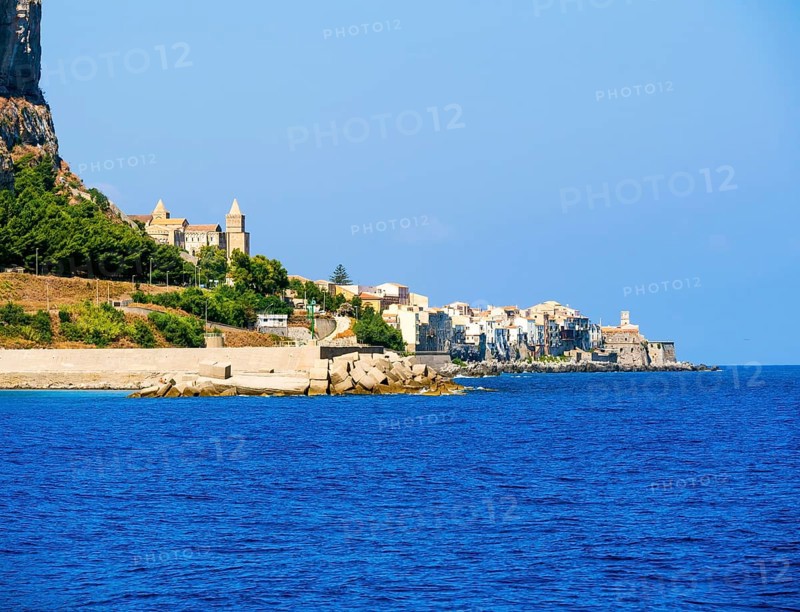 The town of Cefalu at the foot of the Rocca di Cefalu rock