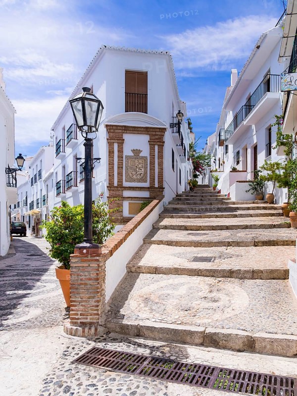 White houses in narrow alleyway