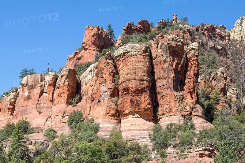 Red rock formations with a face