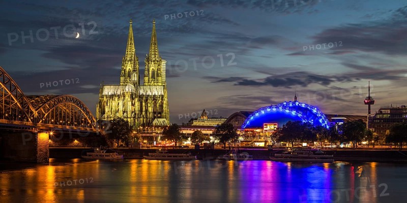 City-panorama of Cologne at dusk