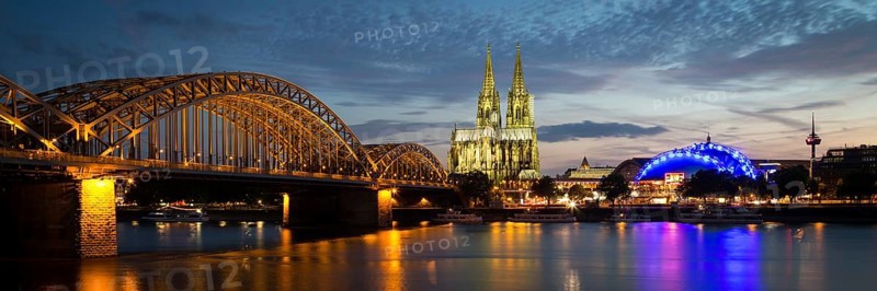 City-panorama of Cologne at dusk