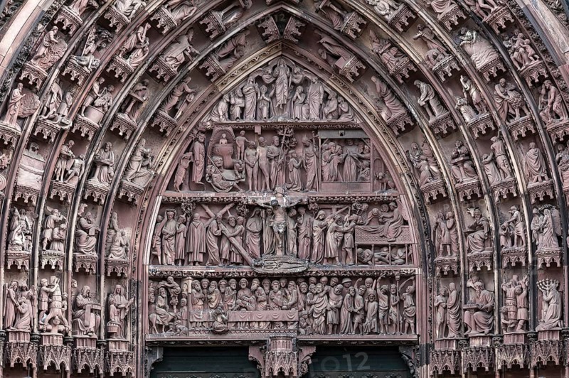 Rich sculptural decoration in the tympanum of the portal at the Strasbourg Cathedral