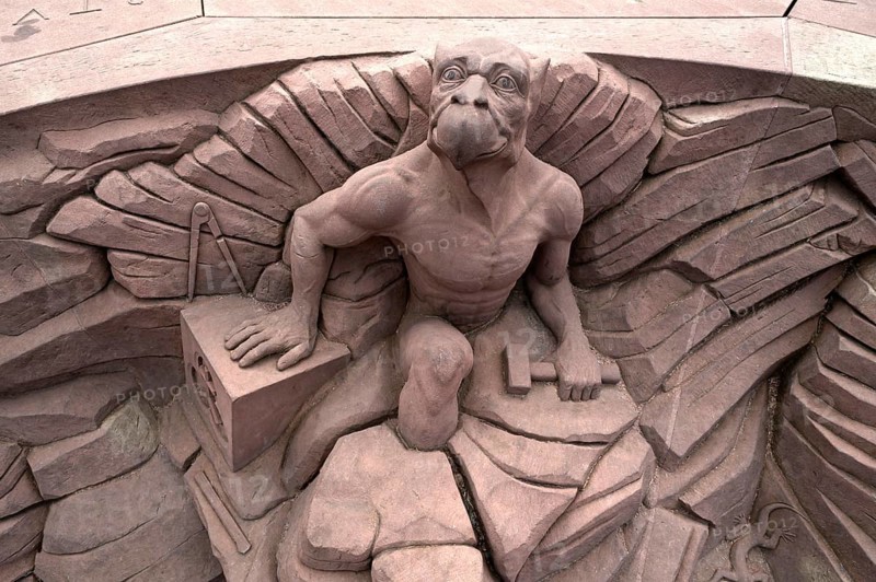 Sandstone sculpture of a chimera on the Place du Chateau