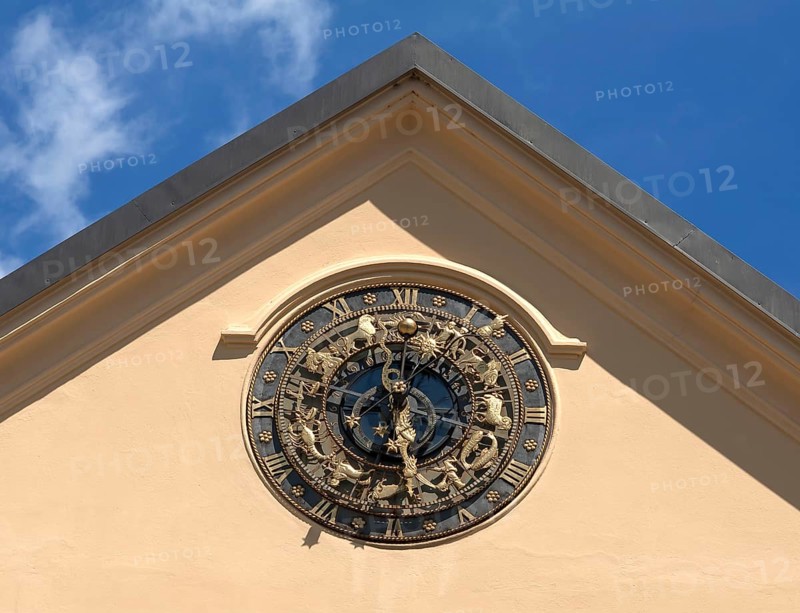Astrological clock on a house