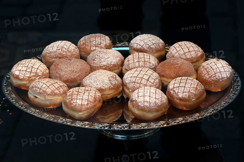 Berliner or doughnuts on a silver platter