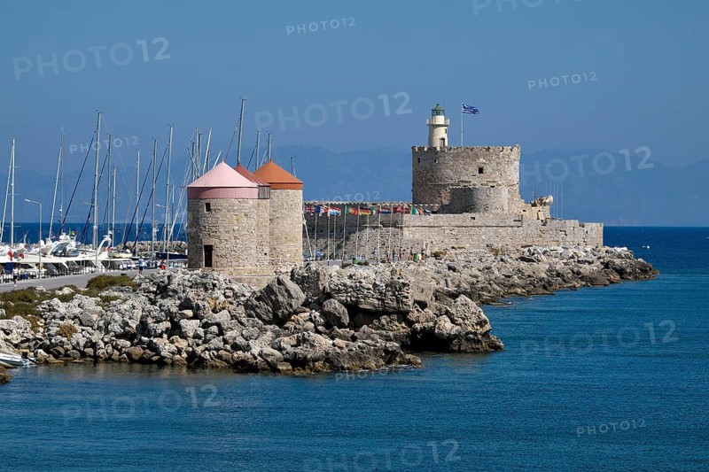 Windmills and Agios Nikolaos fortress at Mandrake harbor