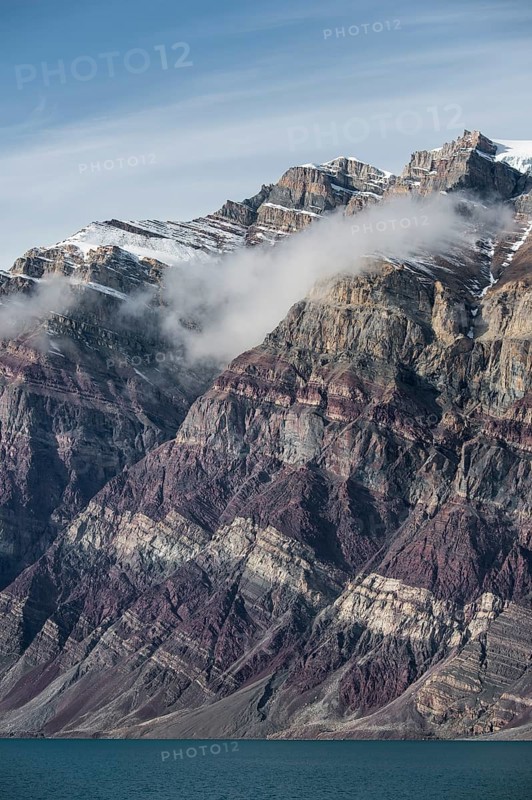 Unfolded coloured rock strata