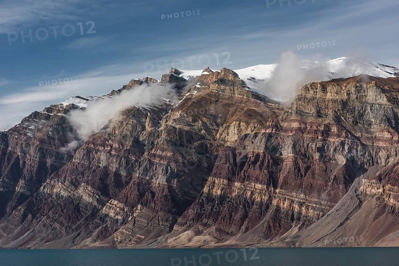 Unfolded coloured rock strata